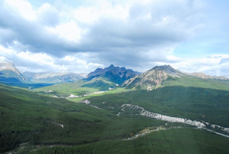 Helicopter Flight into the Canadian Rockies from Cline River Heliport, Alberta