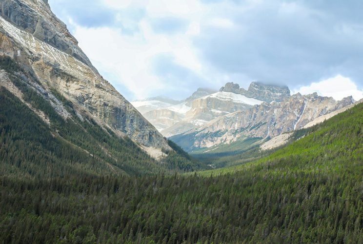 Helicopter Flight into the Canadian Rockies from Cline River Heliport, Alberta