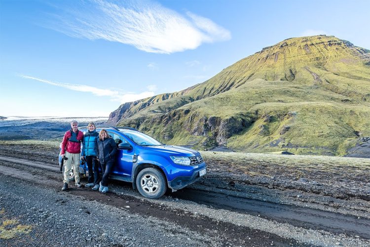 Group shot in front of our off roader vehicle, "Dusty".
